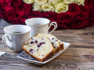 bouquet of red roses and coffee.