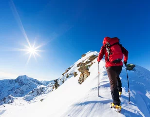 Light filtering roller blinds Mountaineering Extreme winter sports: climber at the top of a snowy peak in the Alps. Concepts: determination, success, brave.