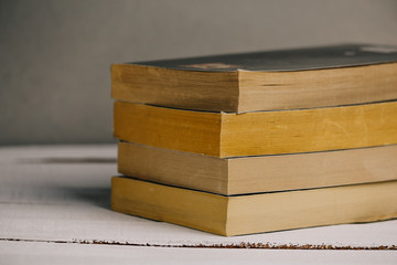 Old Books Background. Books on wooden shelf. Copy space.