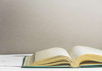 Open book on table. Back to school. Copy space. 