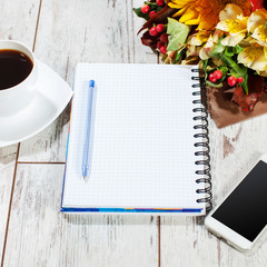 Notebook with pen for planning