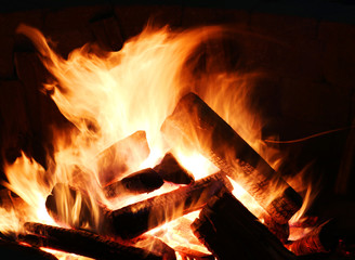 Bonfire flame. A fire burns in a fireplace close up.