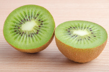 kiwi fruit on the wooden table