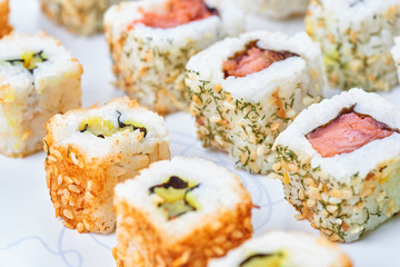 Sushi set on a white table