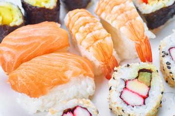 Sushi set on a white table