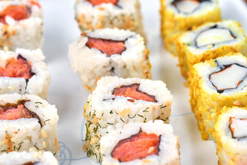 Sushi set on a white table