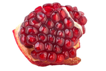 Purified piece of the fruit pomegranate isolated on white background. Red seeds.