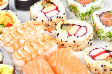 Sushi set on a white table
