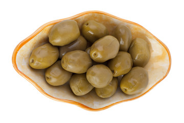 olives on a plate isolated on white background, top view
