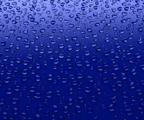 Drops of water on a blue background. 3D illustration