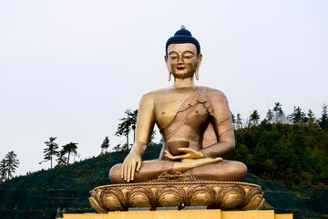 Fototapeta premium Bhutan giant golden bhudda statue monument with a diamond
