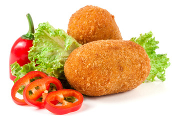 two fried breaded cutlet with lettuce and pepper isolated on white background