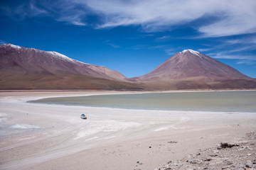 Bolivia Salar de Uyuni altiplano landscape volcano lake and desert remote offroad laguna colorada