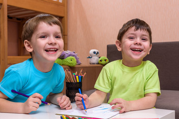 Kids drawing together at home