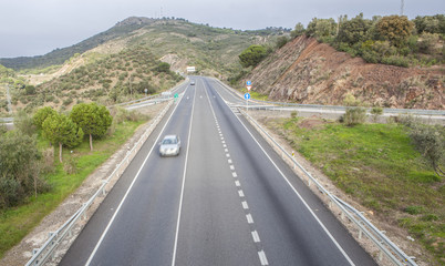 View of traffic at national road with slow vehicles lane