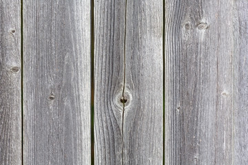Grayed weathered cedar fencing.