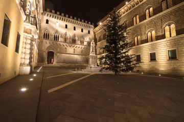 Siena, January 2016: Sallustio Bandini monument and  the main Ga