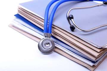 Folder file and stethoscope on the desk