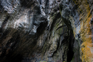 Ile de la Reunion la chapelle rock canyon gorge with river colorful rock formation