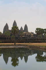 Obraz premium Cambodia Angkor Wat temple complex of ancient khmer civilization in the summer heat with reflection