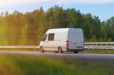 minibus goes on the country highway
