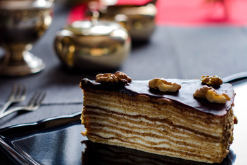 Piece of cake with walnuts.