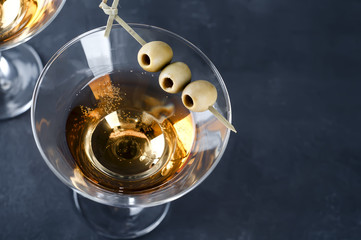 Martini glass and olives