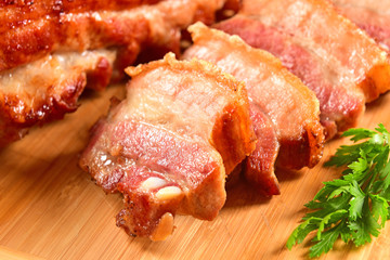 Cracklings on wooden cutting board
