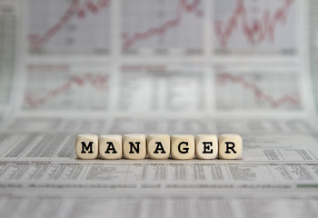 Manager word built with letter cubes