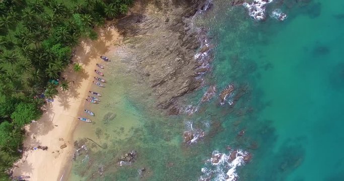 Shooting from air, the destroyed pier, the beach on the tropical island, Phuket, Thailand