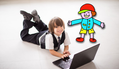 Cute kid with laptop on ground at home