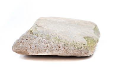 Single natural stone on white background