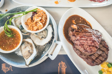 Oysters with Herbs and wagyu beef steak