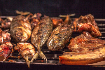 beside the street a small restaurant bbq sea food and pork for sale to tourist