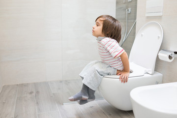 Kid at toilet