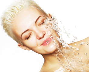 beautiful woman with clean skin with splash of water