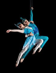 Young couple circus air gymnast
