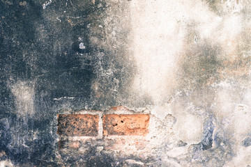 Old wall disintegrated over time.