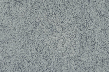 Uneven surface made of gray cement.