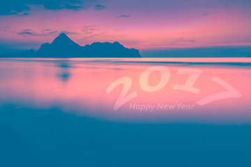 Happy new year 2017. Natural scene beach and sea at sunrise time
