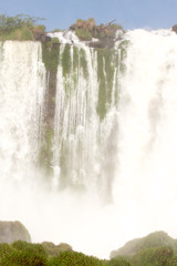 Iguazu (Iguacu) falls, largest series of waterfalls on the planet, located between Brazil,...