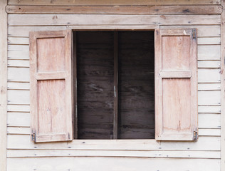 Obraz na płótnie Canvas Old wooden wall see through window