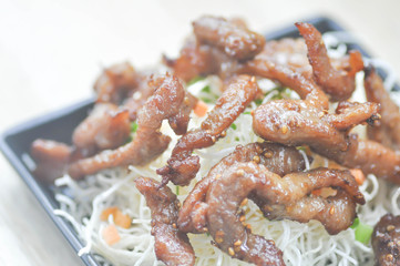 fried pork with fried noodle  (Thai food)
