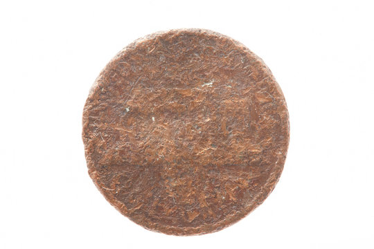 ancient coin, a very old penny isolated on a white background