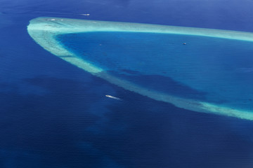 Naklejka na ściany i meble Aerial View from seaplane over Atolls at Indian ocean