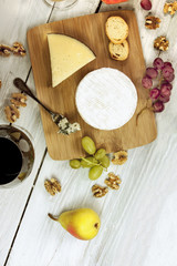 Red wine, cheese, grapes at pairing, with copyspace