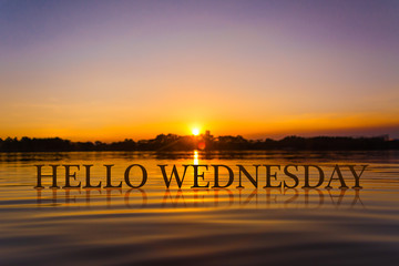 'HELLO WEDNESDAY  ' with sunset water , twilight time