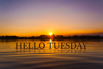 'HELLO TUESDAY  ' with sunset water , twilight time
