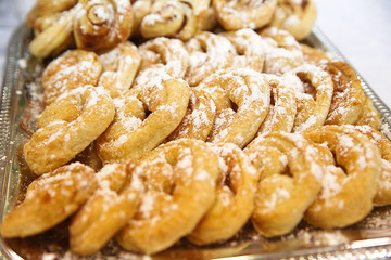 fresh cinnamon rolls sprinkled with vanilla