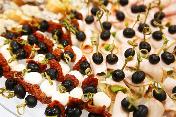 appetizer with  cheese, sun-dried tomatoes.